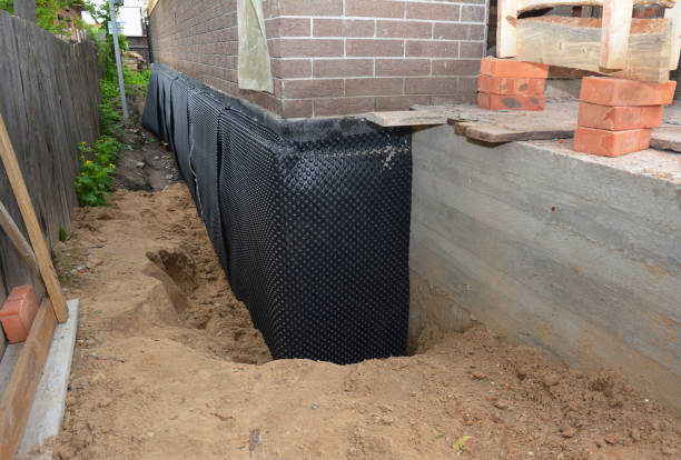 SJ Waterproofing Pros technician performing targeted Sump Pump Installation assessment in Oswego, NY